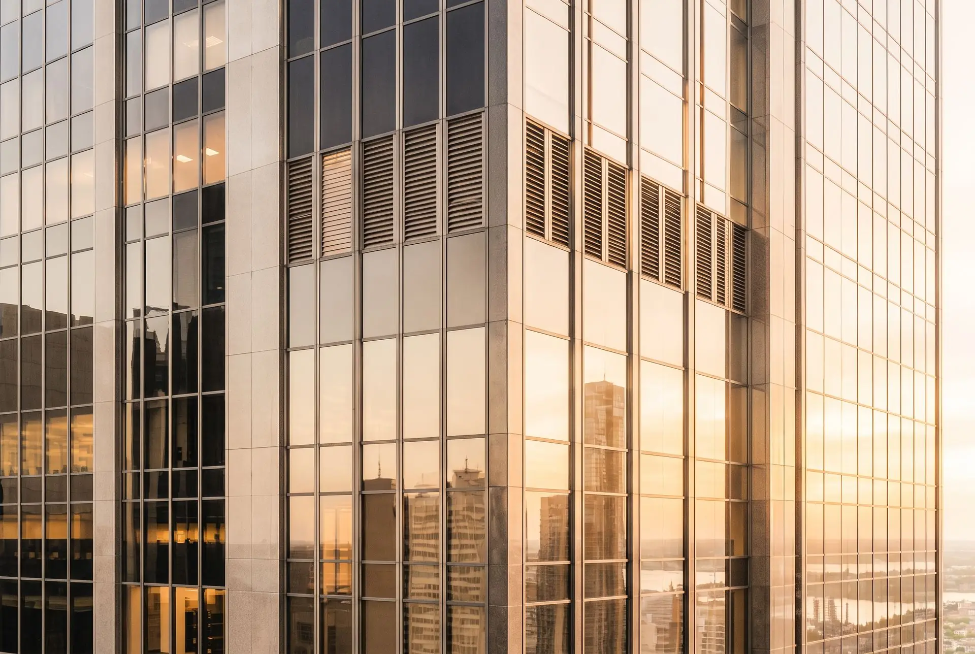 Modern skyscraper against a dusk sky